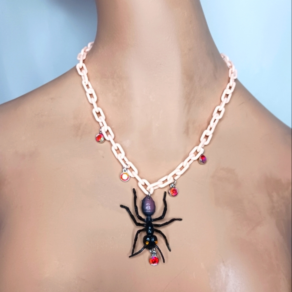 Peach Plastic Link Necklace with Black Ant with Red Iridescent Rhineston…